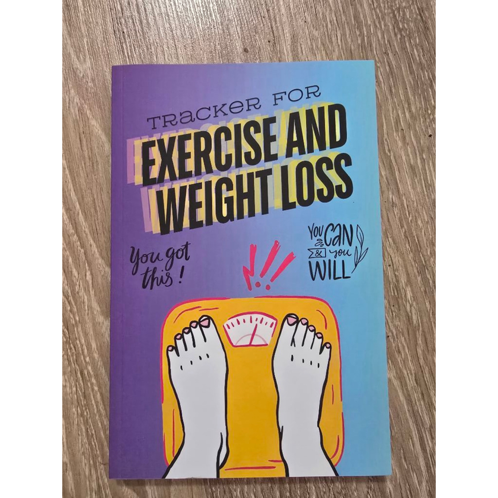 Exercise and weight loss tracker notebook.